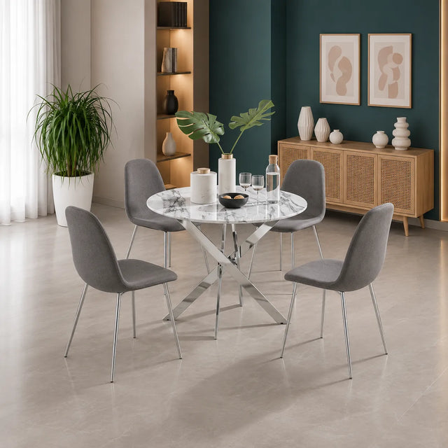 Ronde Table avec chaises avec argent pieds