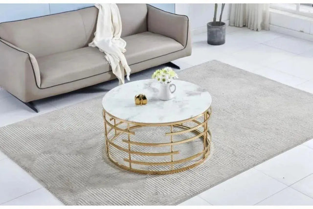 Table basse ronde FANY en marbre blanc dorée
— table basse, table basse design, table basse en bois, table basse pas cher, table basse moderne, table de salon, table basse avec rangement, table basse ronde, table basse rectangulaire